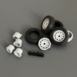 Диски штампованные УАЗ-Патриот со ступицами, тормозными элементами и резиной КАМА-219
